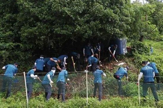 韩国警方在接到报案后,在山上展开大规模搜查。