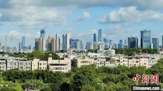 绿树环绕的广州城区。(资料图)王坚 摄
